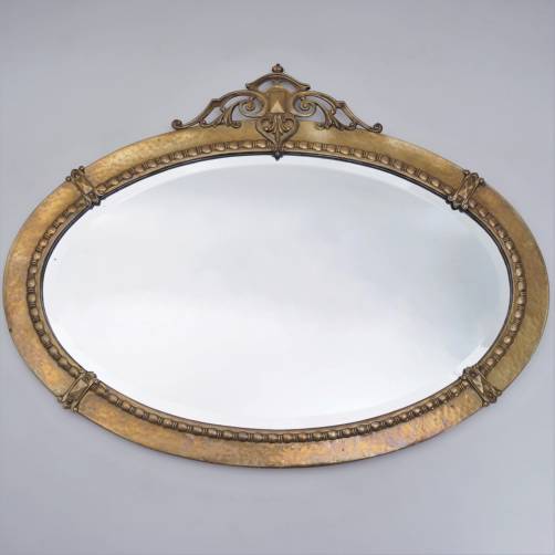 Antique Arts & Crafts wall mirror, hammered brass, oval, 1900 ca, English